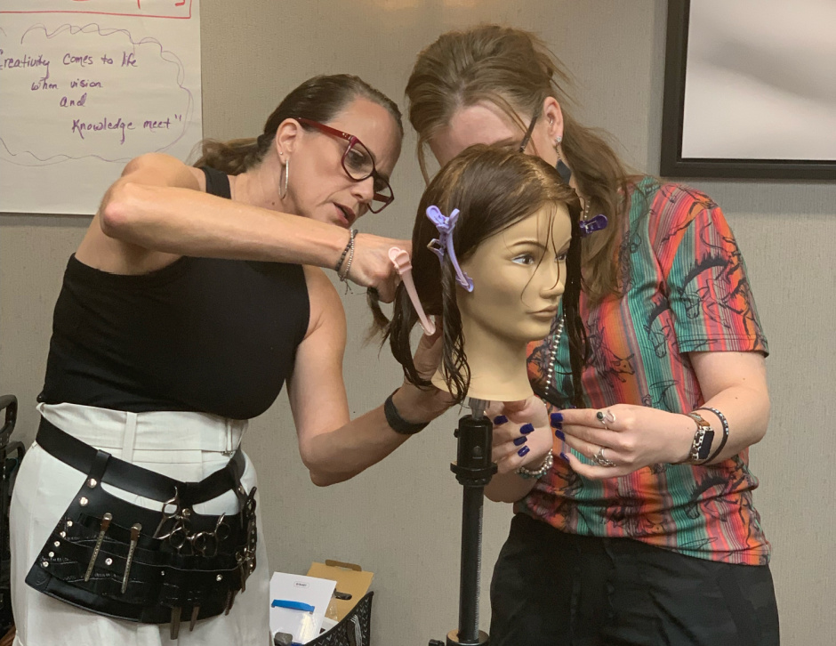 hairstylist educator teaching new stylists